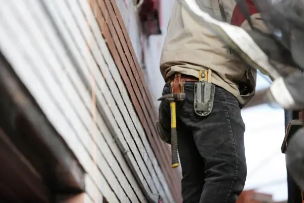 Technician arriving for a slab leak detection visit