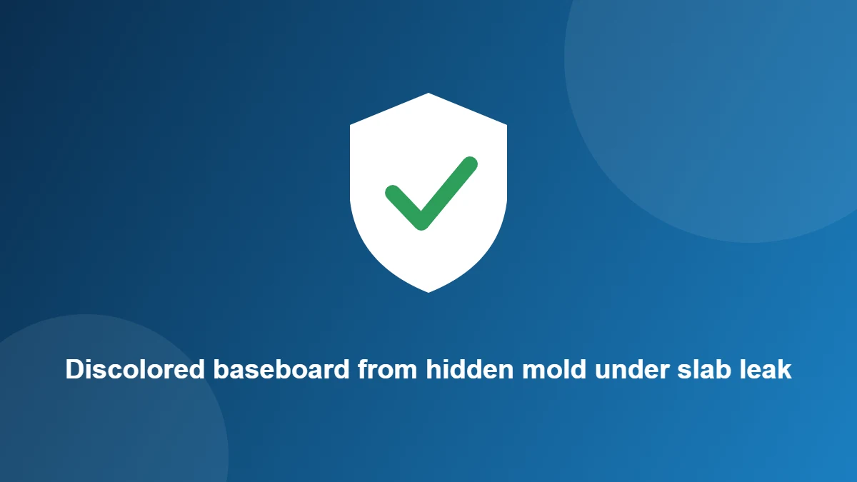 Illustration: Discolored baseboard from hidden mold under slab leak