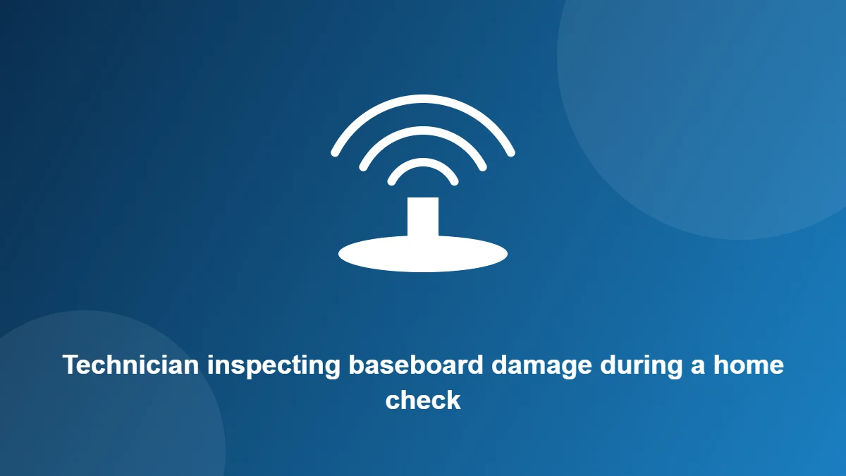 Illustration: Technician inspecting baseboard damage during a home check